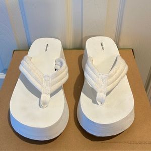 Terry cloth wedge flip flops